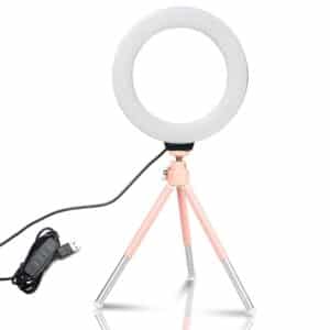 Anneau lumineux LED pour photos et vidéos, sur trépied rose, avec chargeur USB, présenté sur fond blanc