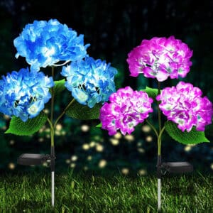 Lampe fleurs LED solaire pour jardin, le modèle est présenté 2 fois, en rose et en bleu, les fleurs sont éclairées