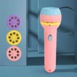 Lampe torche enfant rose avec projection d'animaux , avec 3 disques colorés pour changer les motifs