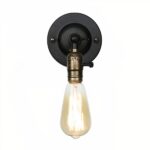 Une applique murale de style ancien avec un socle noir et une ampoule design vintage.