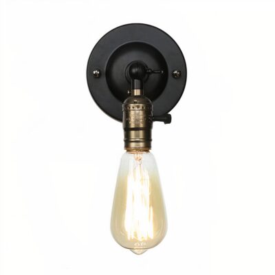 Une applique murale de style ancien avec un socle noir et une ampoule design vintage.
