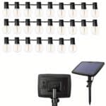 Lampe solaire guirlande lumineuse de décoration présentée sur un fond blanc