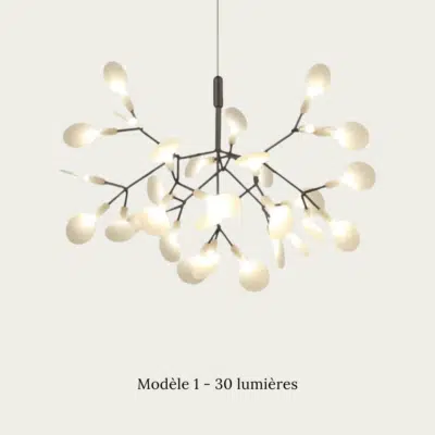 Un lustre suspension LED design en forme d’arbre moderne illuminant une salle à manger élégante avec table ronde, banquette grise et tableau mural.